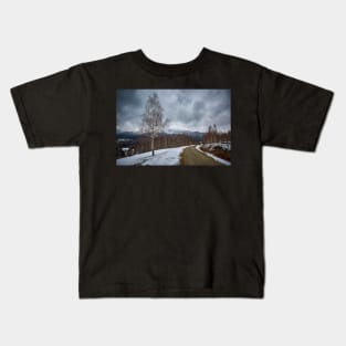 Road in the mountains Kids T-Shirt